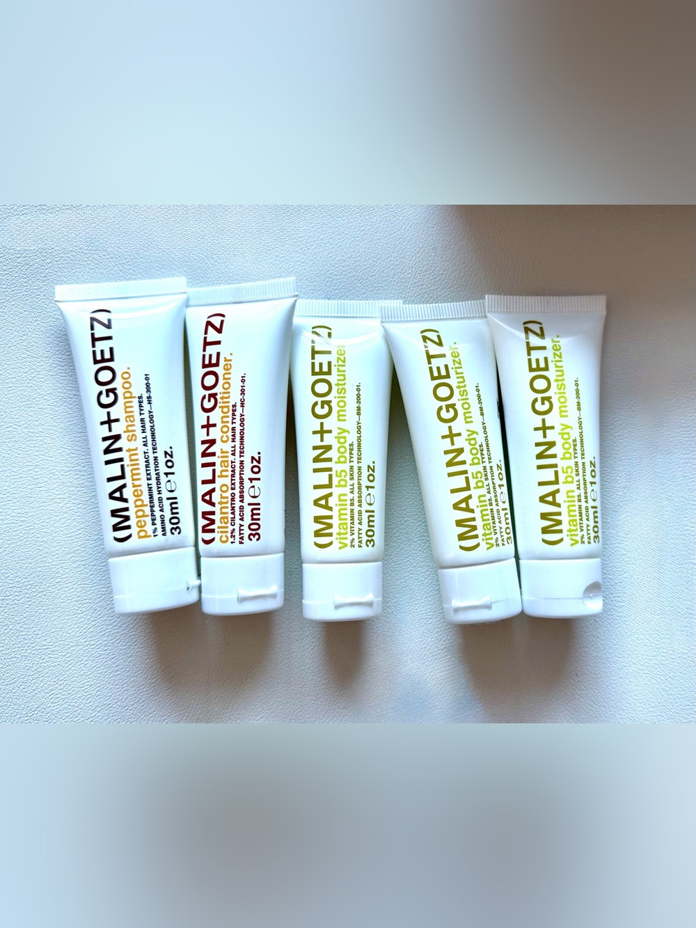 Malin+Goetz | Travel Set | Shampoo, Conditioner, 3 Moisturizer | New